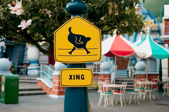 xing sign at Disneyland - the cat you and us