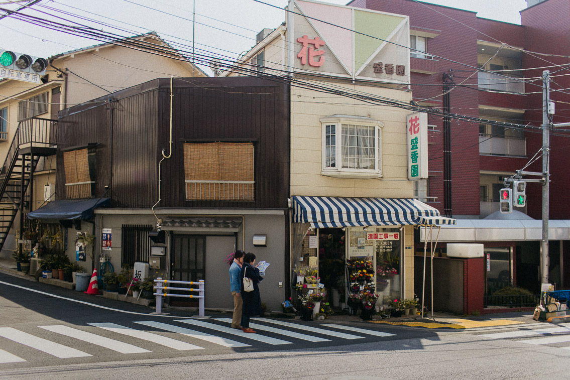 Yanaka storefronts - The cat, you and us